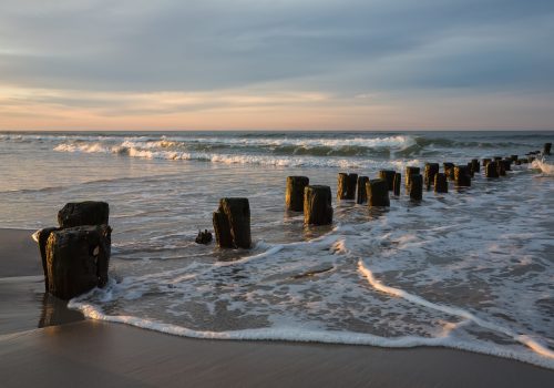 Early morning on the oceanfront. Atlantic Ocean coastline near New York in the area of Rockaway Park